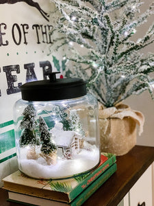 Learn how to create a snowy scene in a jar! It's the simplest vignette to create for the holidays and all winter.